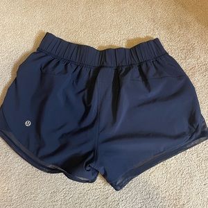 Lululemon hotty hot short, reversible, mid/low rise, 2.5 inch inseam. Size 4